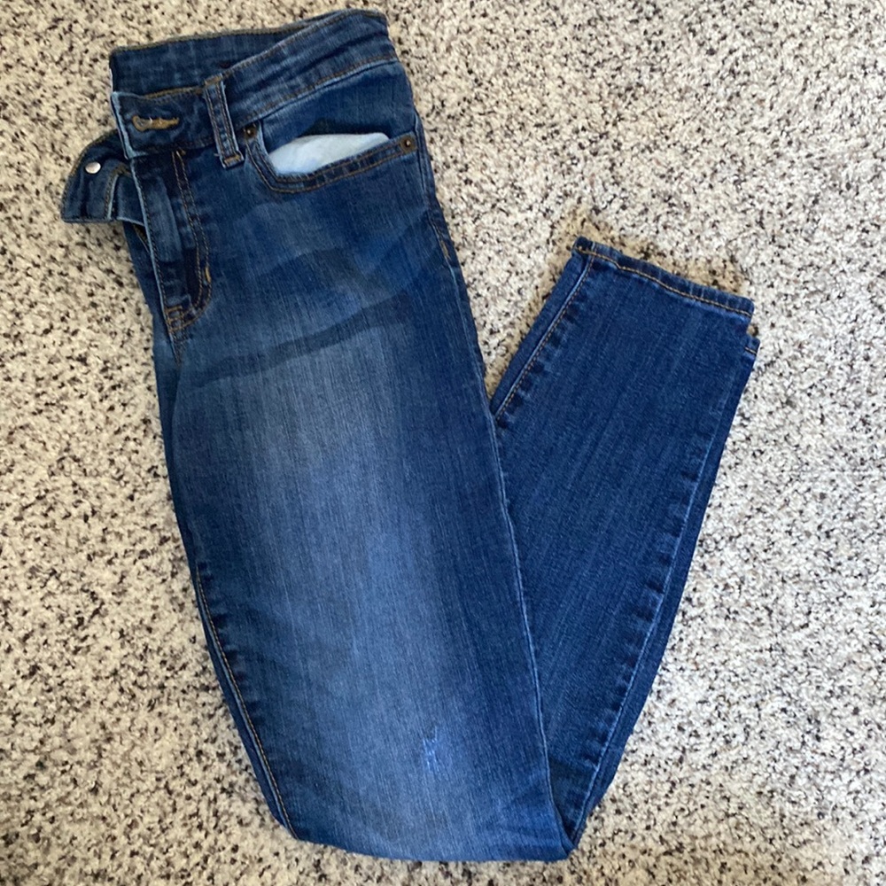 Gap Skinny jeans. Minor distressing, medium wash. Size 2/26.